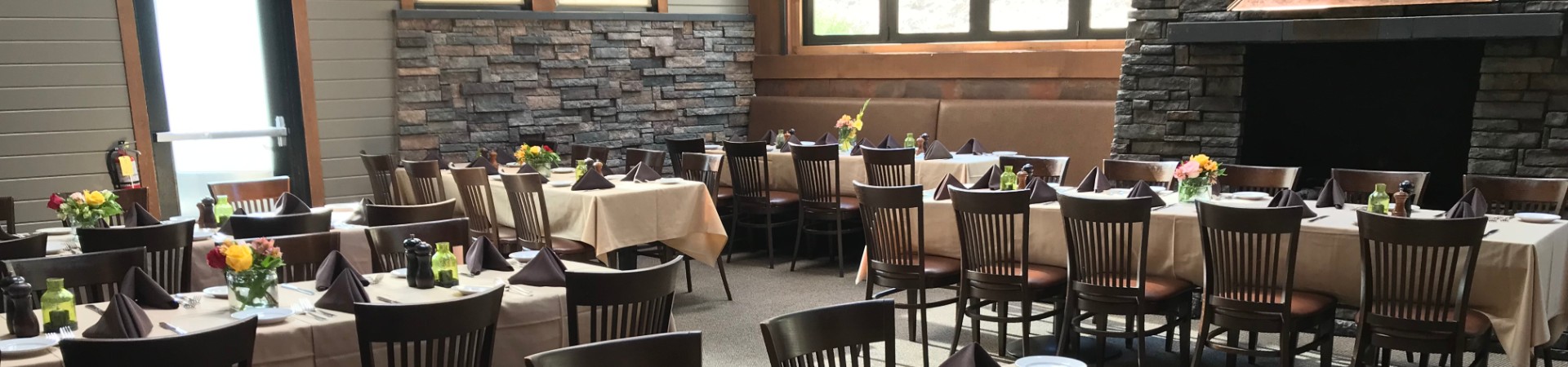 Dining tables set up in banquet layout