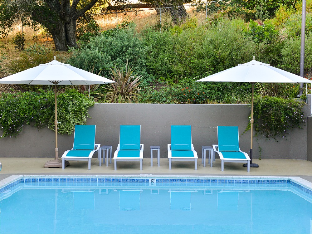 Outdoor pool with umbrellas